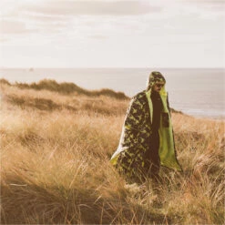 Gul Evorobe Hooded Changing Robe -Surf Sales Shop 37374 202320GUL20Evorobe20Hooded20Changing20Robe20AC012820 20Camo20Black20Lifestyle201.2000x2000